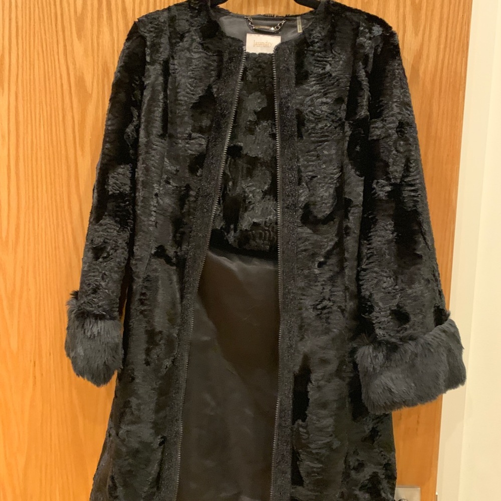 Fancy long faux fur coat with hand warmer